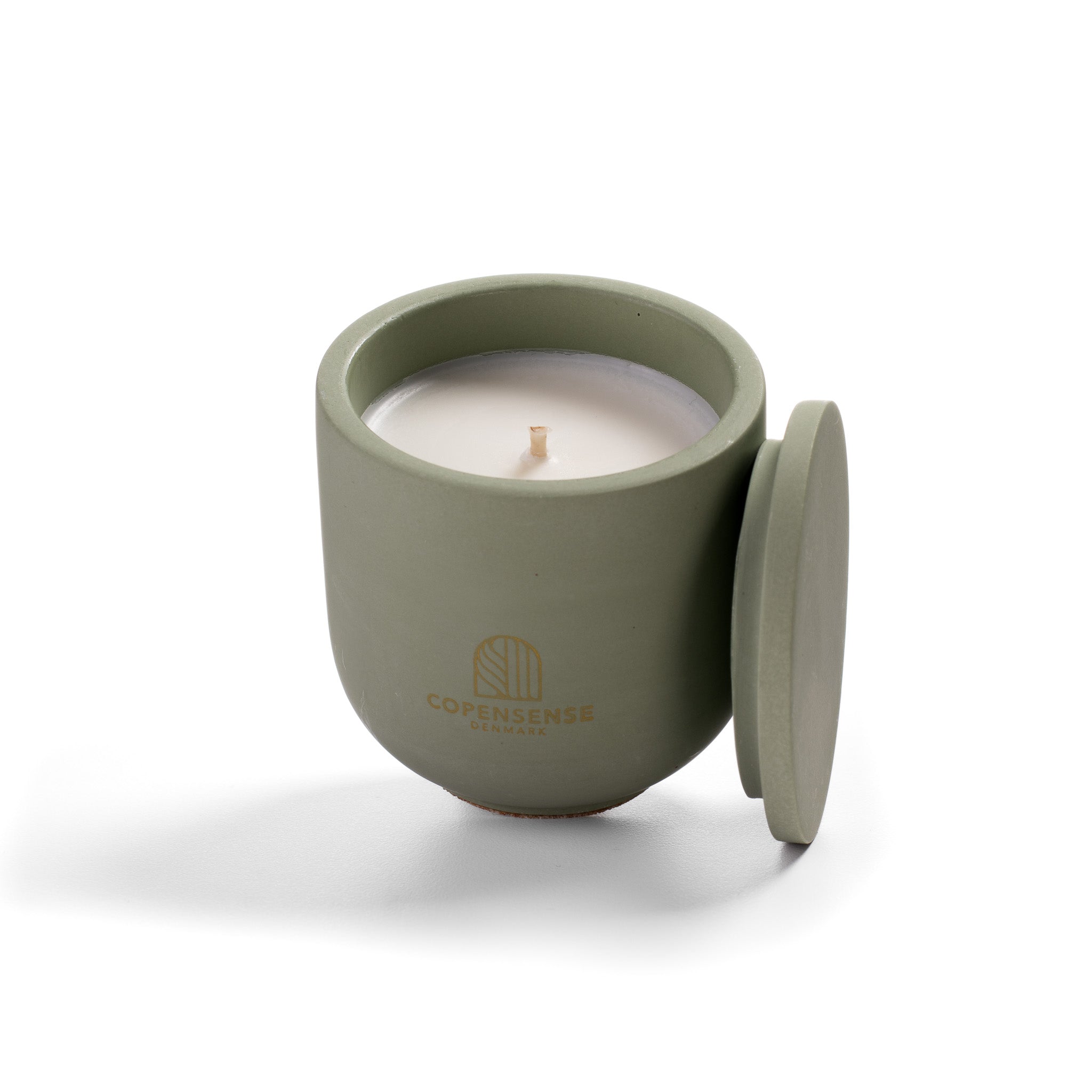 Open Herbal Sanctuary candle showing natural rapeseed wax texture and wooden wick inside green ceramic vessel.