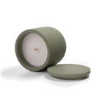 Open Herbal Sanctuary candle showing natural rapeseed wax texture and wooden wick inside green ceramic vessel.