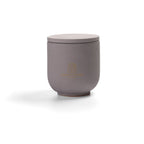 Intense Silence Scented Candle in Nordic Slate grey jar. Notes of amber and leather. 90g, 25h burn time.