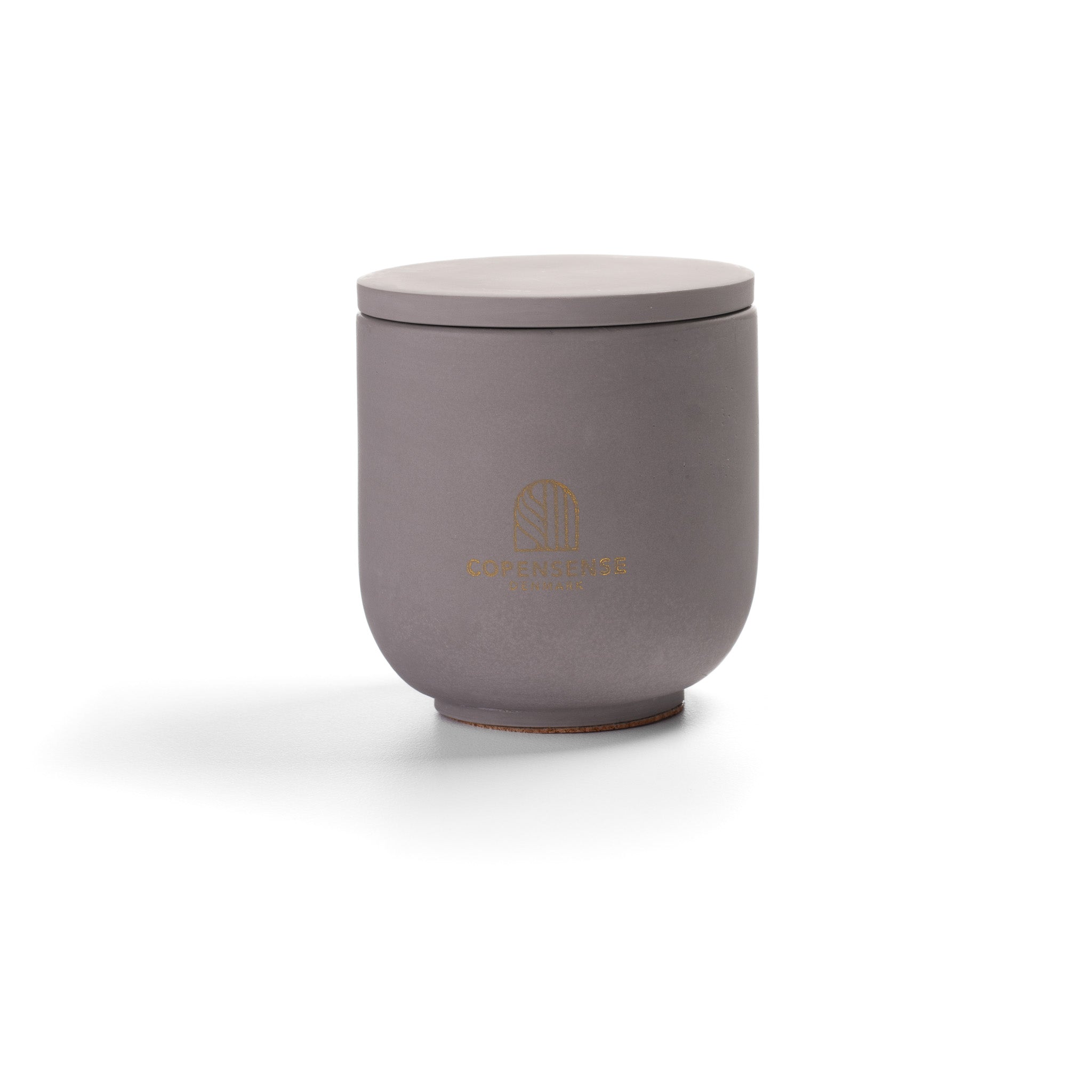 Intense Silence Scented Candle in Nordic Slate grey jar. Notes of amber and leather. 90g, 25h burn time.