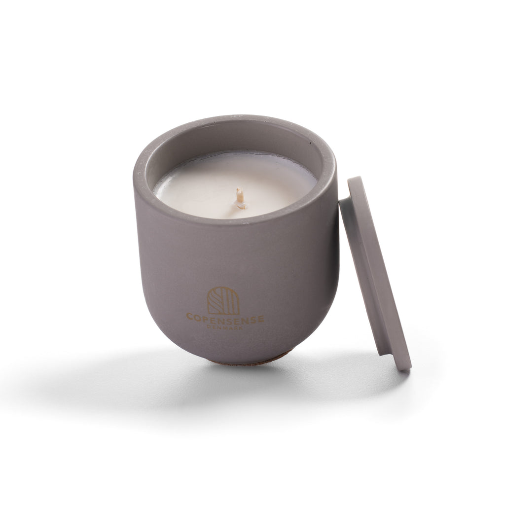 Close up of clean rapeseed wax against dark grey Nordic Slate vessel.