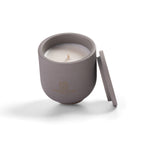 Close up of clean rapeseed wax against dark grey Nordic Slate vessel.