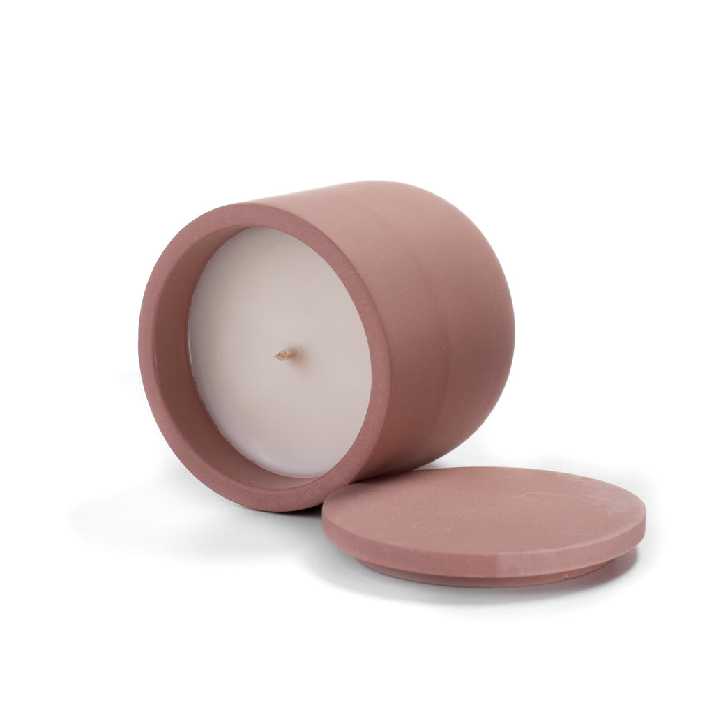 Open Pure Whisper candle showing creamy rapeseed wax and cotton wick inside pink ceramic vessel.