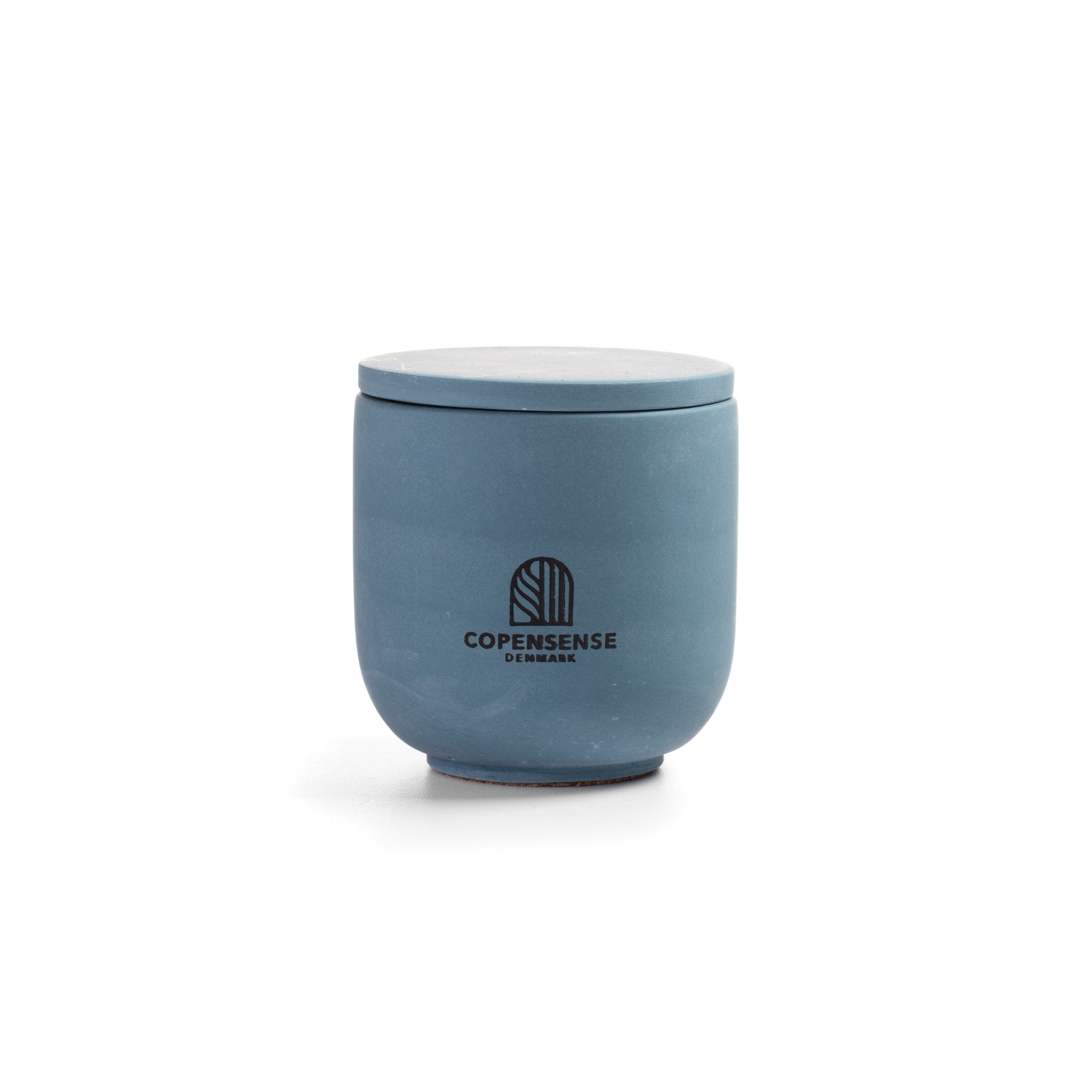 Blue ceramic jar candle with lid on a white background from Copensense Denmark