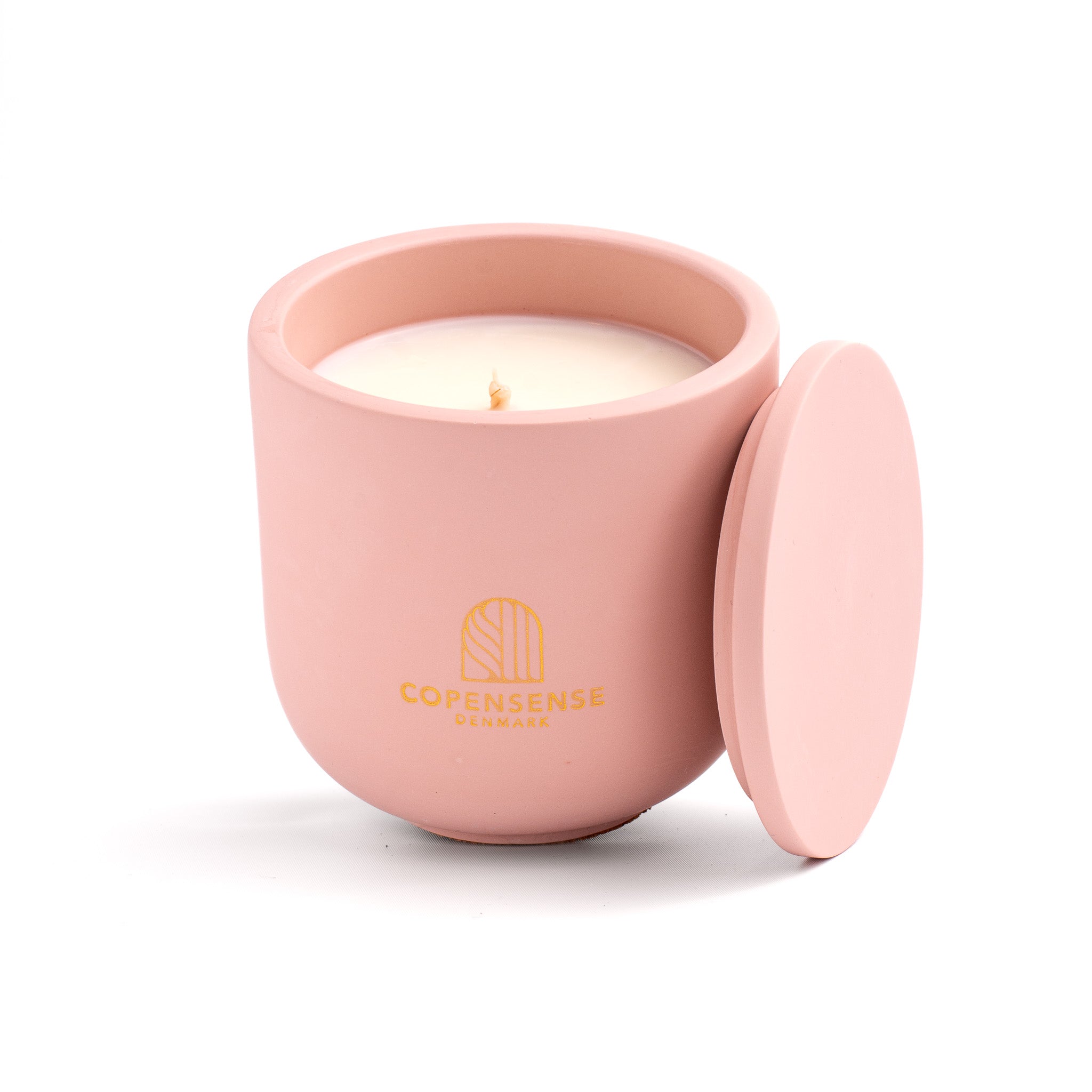 Pure Whisper scented candle in a Pale Pink jar, hand-poured in Denmark