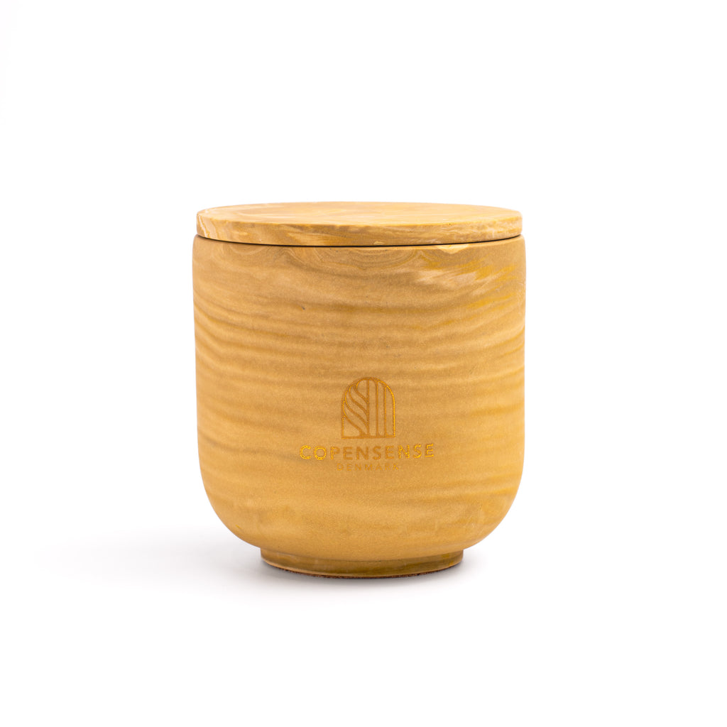 Unscented candle in a marbled Shades of Amber  jar, hand-poured in Denmark