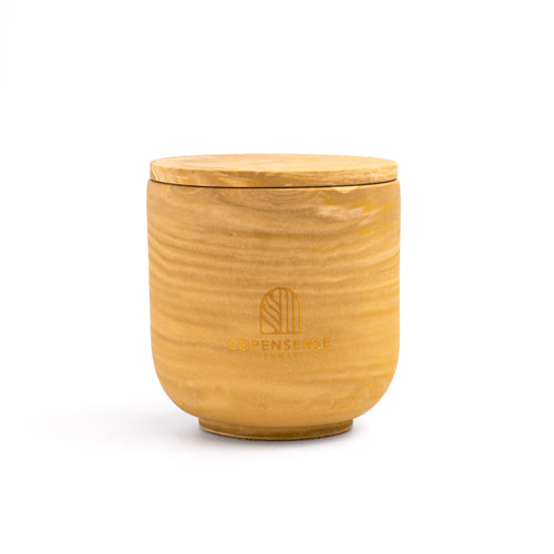 Unscented candle in a marbled Shades of Amber  jar, hand-poured in Denmark