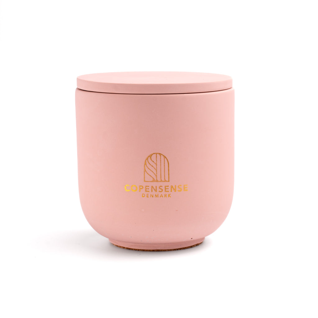 Pure Whisper scented candle in a solid Pale Pink jar, hand-poured in Denmark