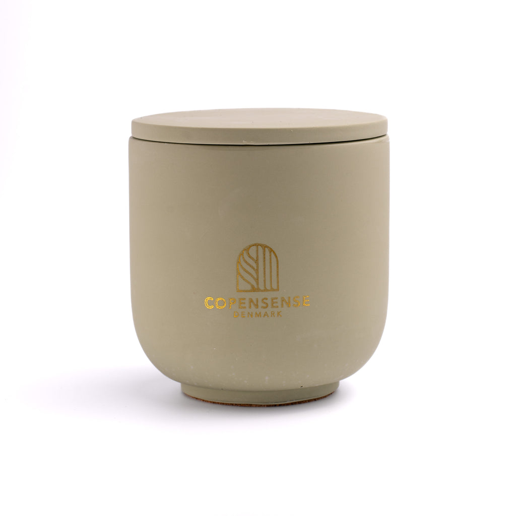 Herbal Sanctuary scented candle in a solid Sage Green jar, hand-poured in Denmark
