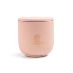 Pure Whisper scented candle in a solid Blush Pink jar, hand-poured in Denmark