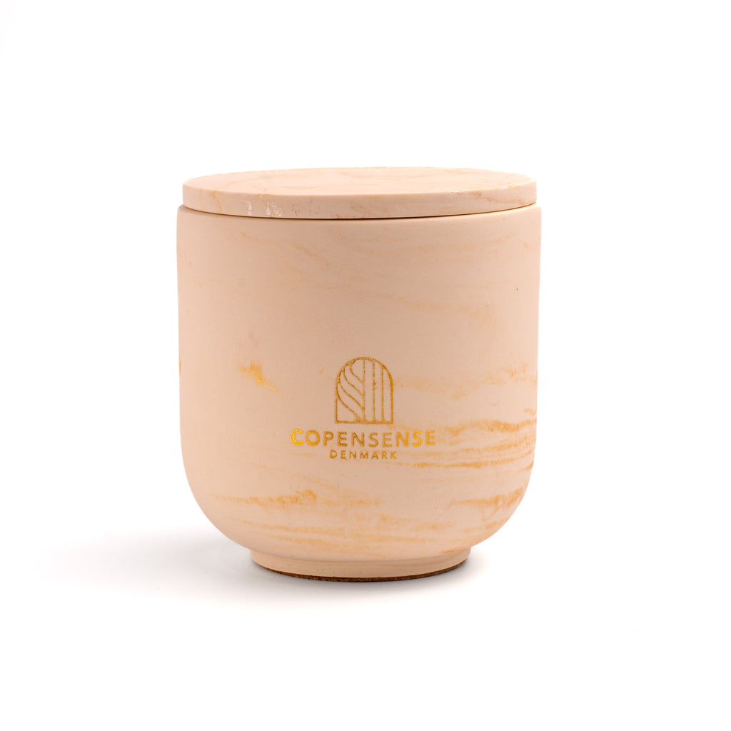 Unscented candle in a marbled Shades of Rose Clay jar, hand-poured in Denmark