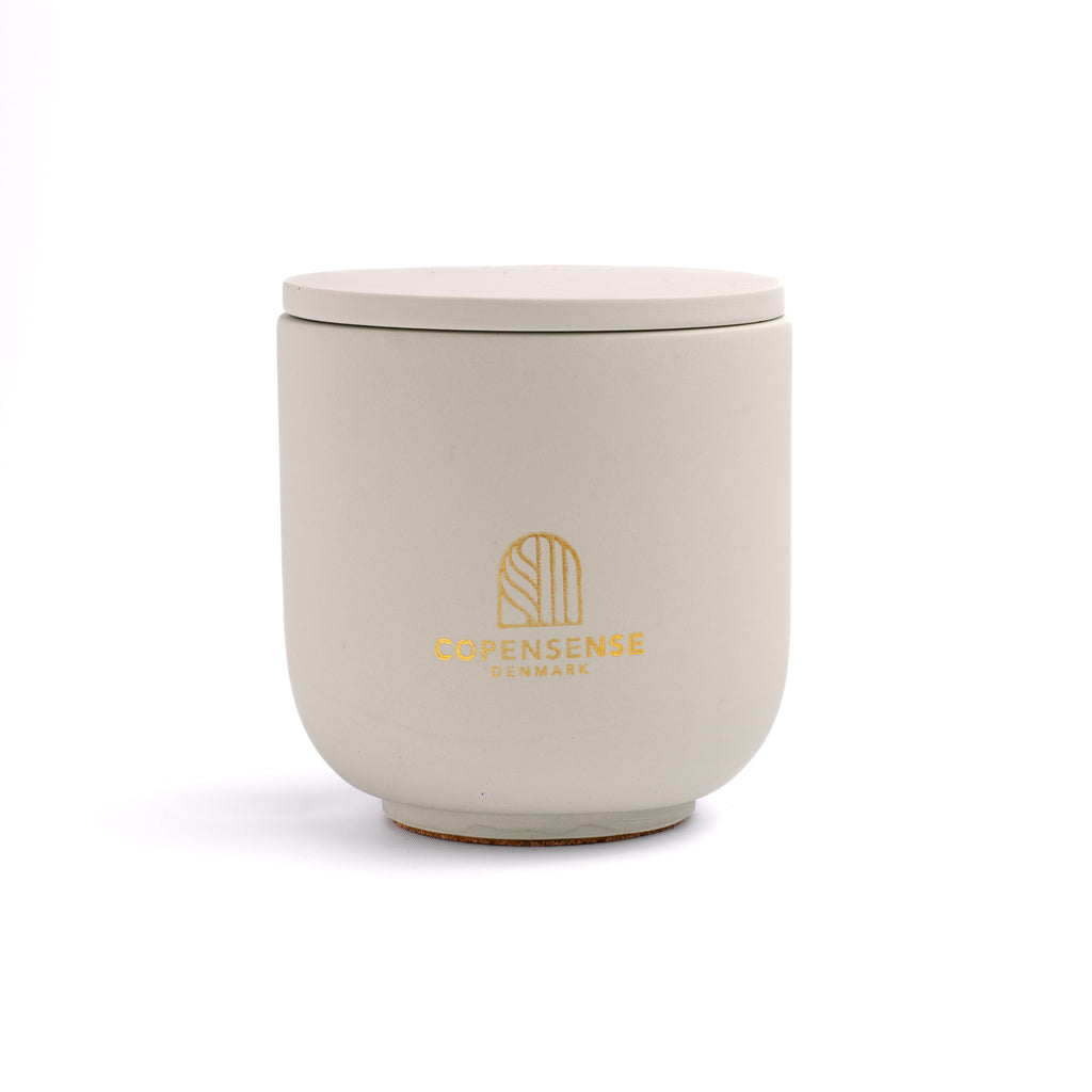 Herbal Sanctuary scented candle in a solid Pale Sage jar, hand-poured in Denmark