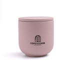 Pure Whisper scented candle in a solid Muted Purple jar, hand-poured in Denmark