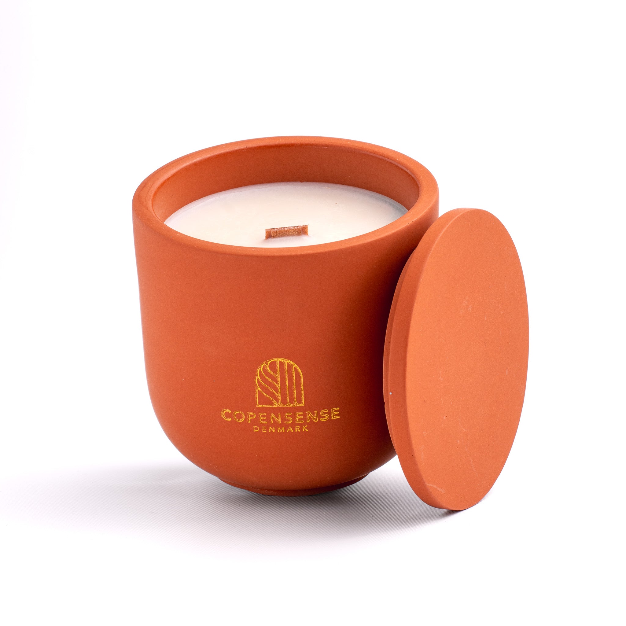 Unscented candle in a solid Shades of Marbled Earth jar, hand-poured in Denmark