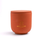 Unscented candle in a solid Shades of Marbled Earth jar, hand-poured in Denmark