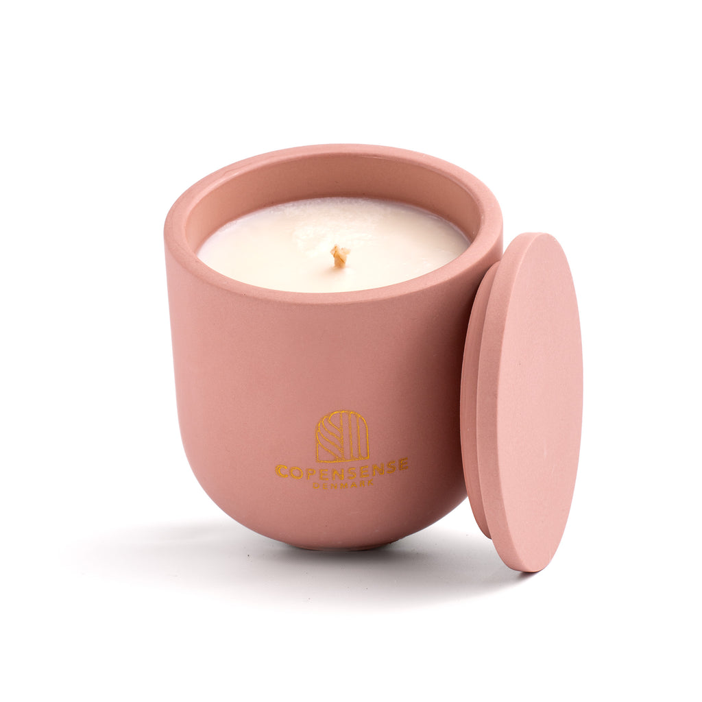 Pure Whisper scented candle in a Dusty Rose jar, hand-poured in Denmark