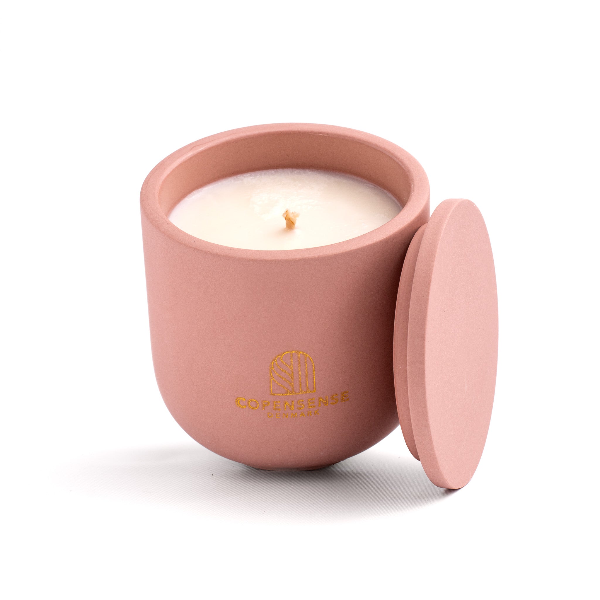 Pure Whisper scented candle in a Dusty Rose jar, hand-poured in Denmark